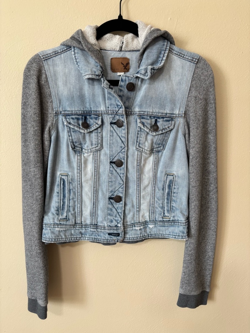 American Eagle Light Wash Denim Jacket with Gray Knit Sleeves